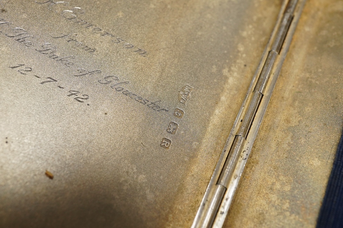 A George VI engine turned silver cigarette case, with interior engraved inscription relating to HRH Duke of Gloucester, Mappin & Webb, Birmingham, 1941, 11.4cm.